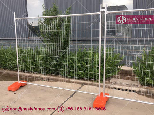 Système de clôture temporaire HESLY. Un support en acier. Un bloc en plastique orange. fournisseur