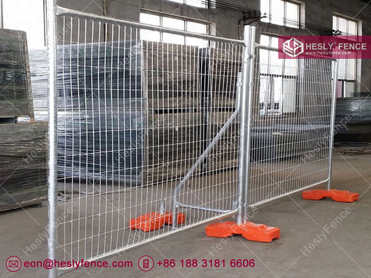Système de clôture temporaire HESLY. Un support en acier. Un bloc en plastique orange. fournisseur